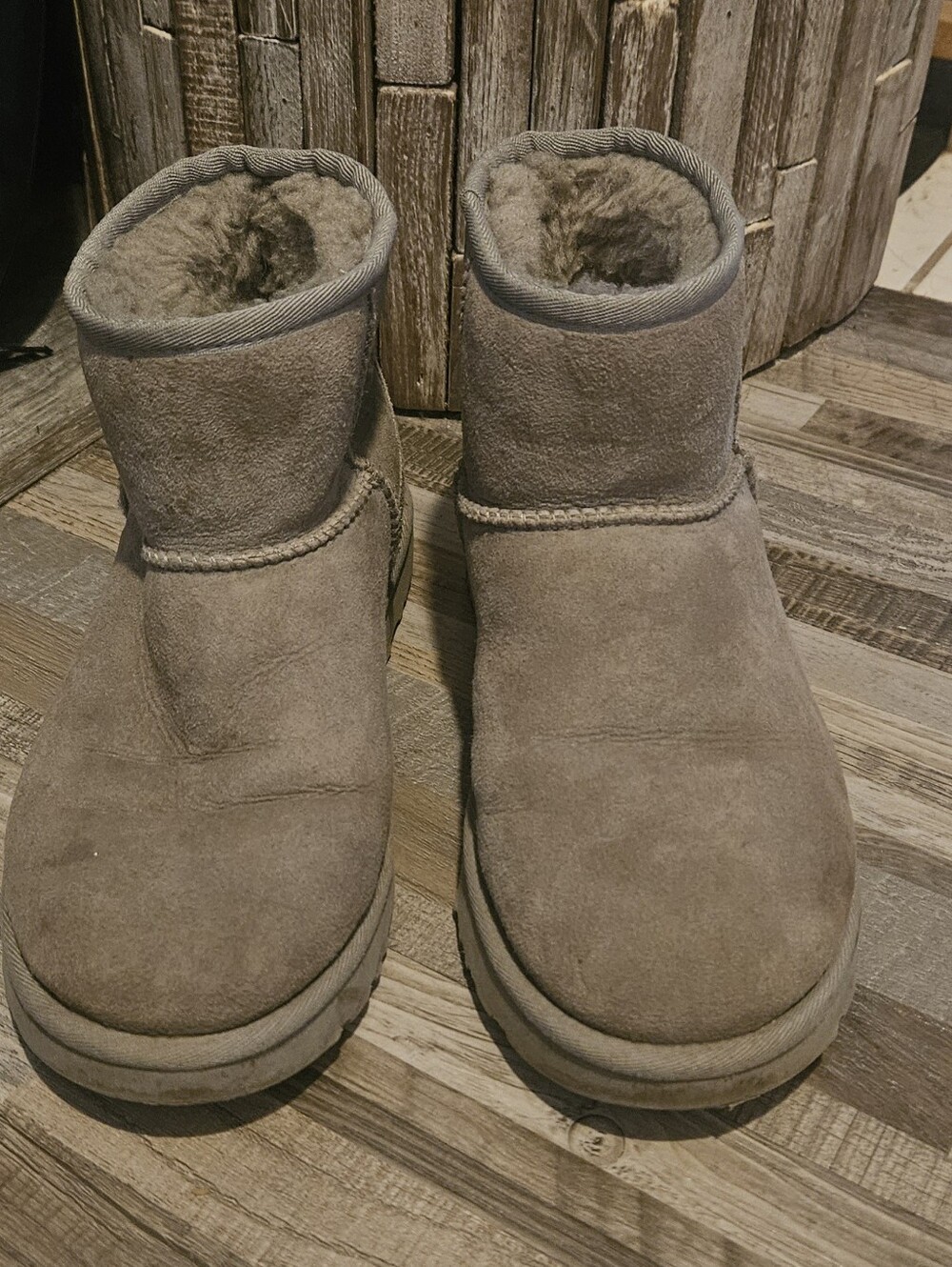 Taupe UGG Classic Mini II boots. 8